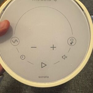 Medela Sonata Pump Interface in Cream and Gray